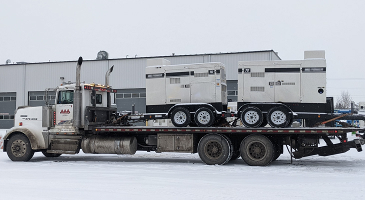 The Role of Flatbed Trucks in Modern Equipment Hauling